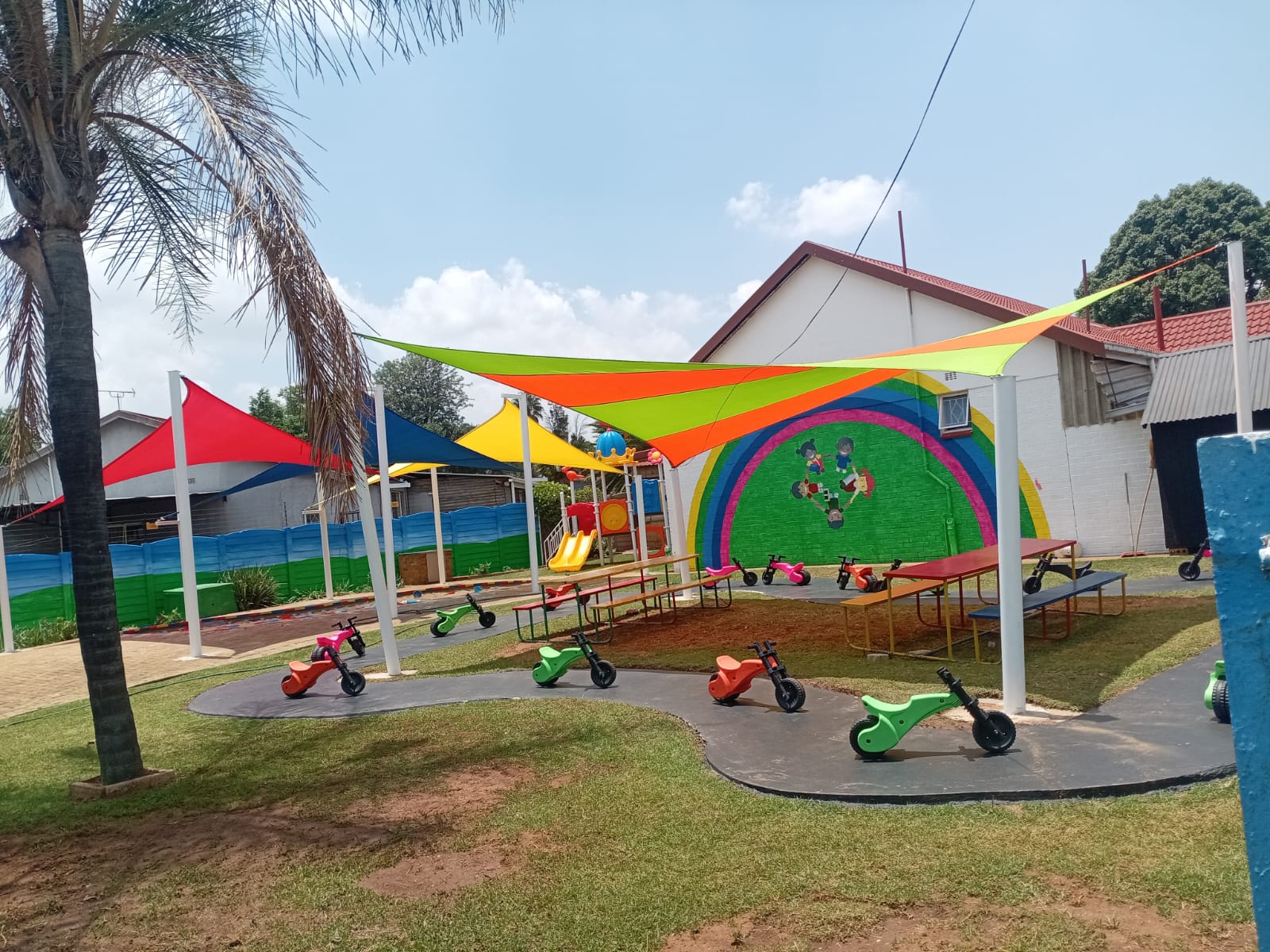 Colourful playground shade sails