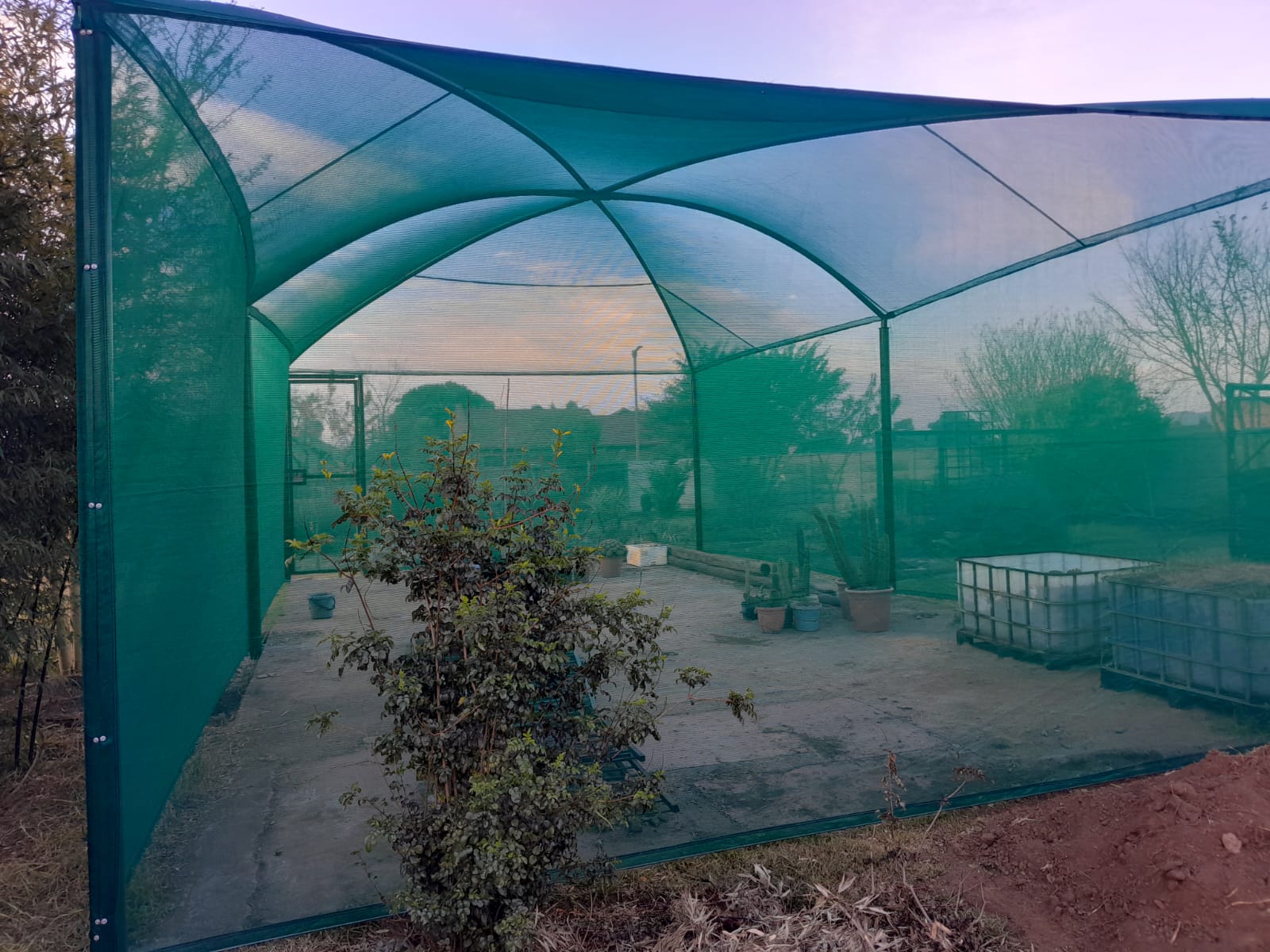 Enclosed green shade net installation